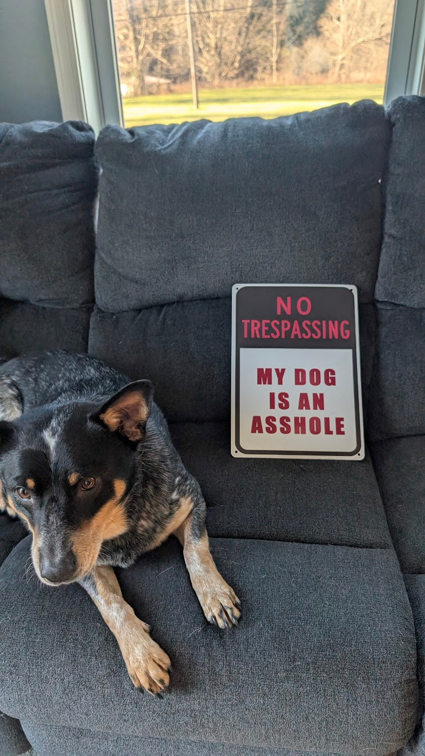 My dog is an asshole sign